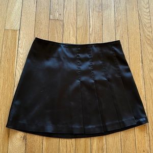 Morgan de Toi Black Charmeuse Mini Skirt with Pleat detail